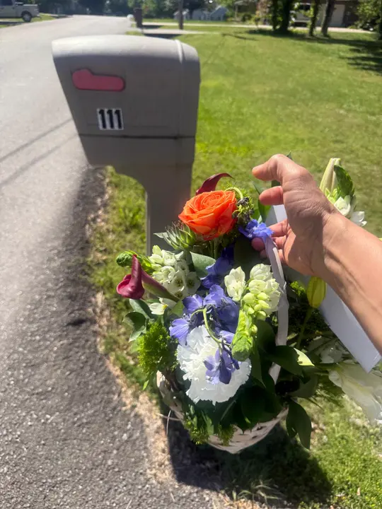 Basket bouquet delivered to a residential mailbox